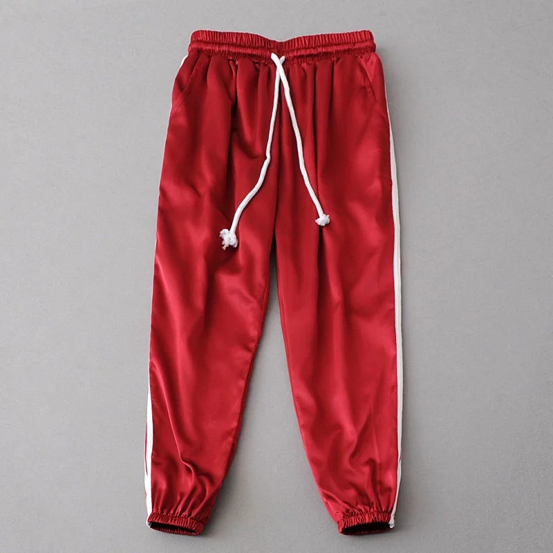 red jogger pants with white stripe