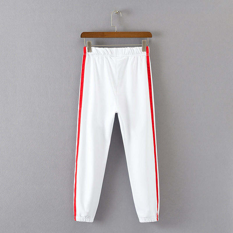 white joggers with red stripe