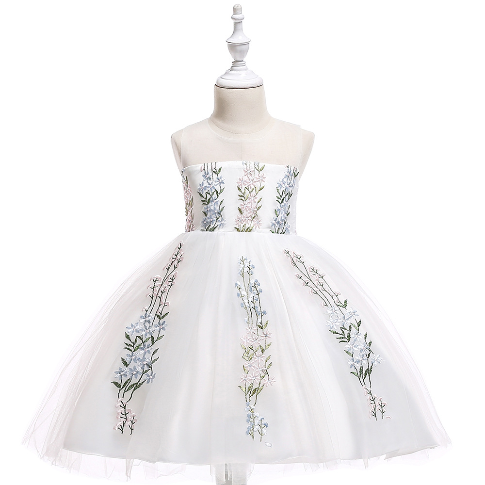white dress with embroidered flowers